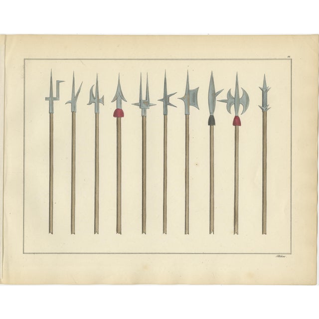 19th-Century Hand-Coloured Lithograph Compilation of Ornate Medieval Polearms Description: This carefully curated...