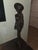 An extraordinary, exhibition-scale pair of matching mid-century Balinese modernist realism sculptures depicting a...