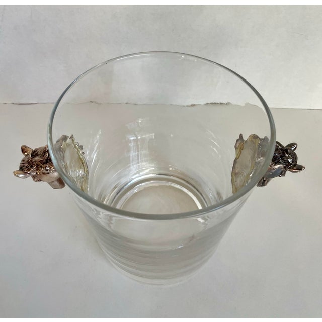 Here is a wonderful piece designed by Arthur Court in the later 20th c. The ice bucket/bowl is made of glass with two...