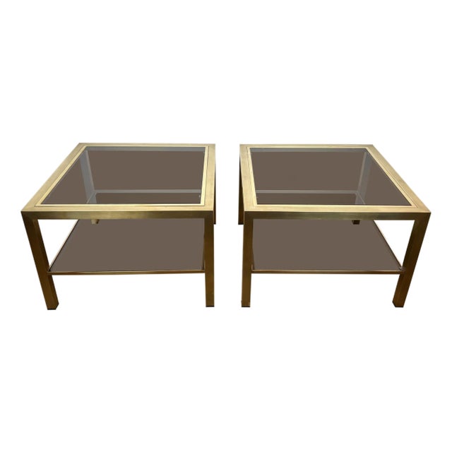1970s Pair of large brass side tables with smoked glass For Sale