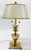 Vintage brass pineapple lamp with ivory metal tole shade. Lamp has double sockets with separate brass pulls for each bulb....