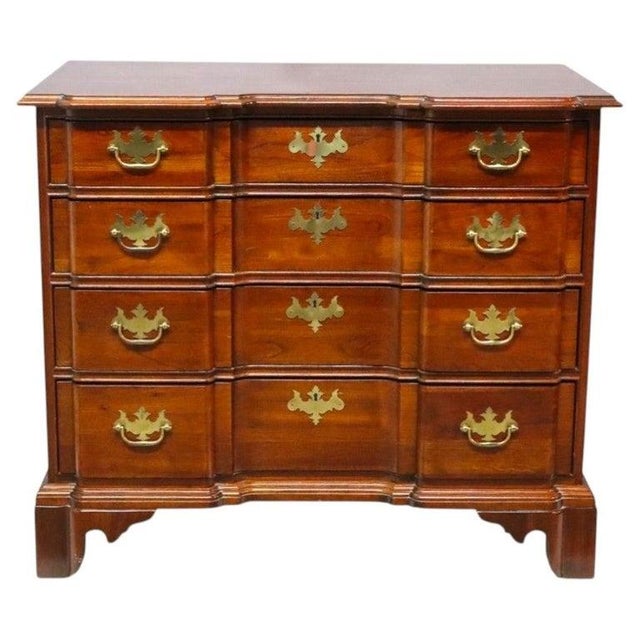 This antique Chippendale style chest of drawers by Knob Creek is crafted from cherry wood, featuring a distinctive block...