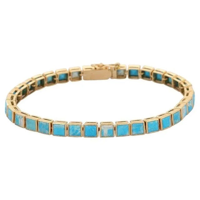 This is part of Chairish’s Fine Jewelry assortment. This Turquoise Tennis Bracelet Tennis Bracelet in 18K gold showcases...