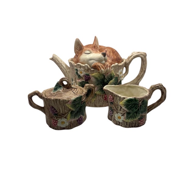 A vintage Reynard (Sleeping Fox) 5 piece tea set by Fitz & Floyd, ca. 1990. The set consists of a 32 ounce teapot with a...