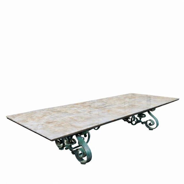 A monumental custom-made outdoor forged-iron table designed by Parisian designer Jean-Rémy Couradette and executed by Deco...