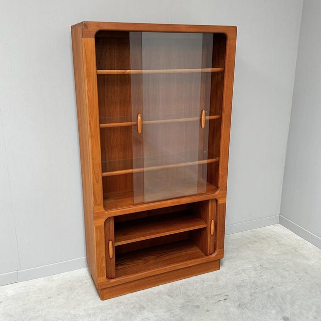 Danish Display Cabinet in Teak by Dyrlund, 1980s, in Very Good conditions. Designed 1960 to 1969 I have official proof of...