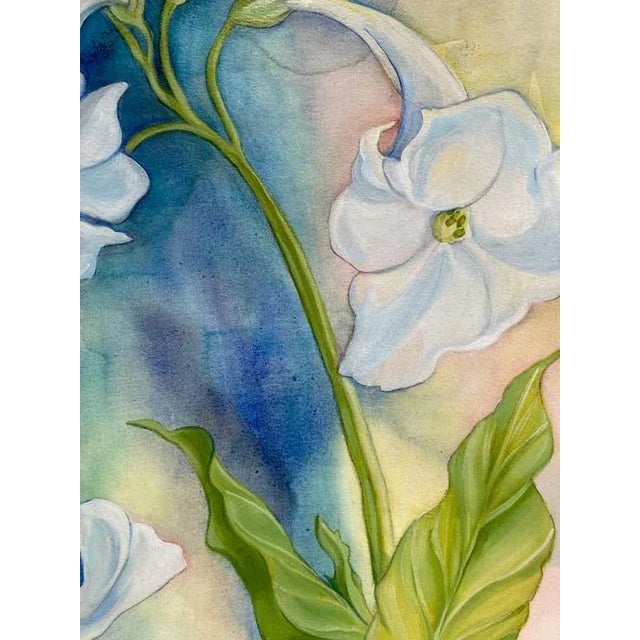 A contemporary colorful floral painting. This uplifting art piece would look great in a variety of settings. A dramatic,...