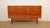 Almost two meters wide, yet remarkably airy in appearance. This beautiful Danish highboard from the 1960s is a fine...