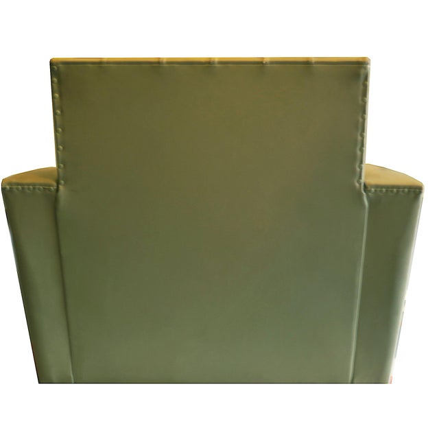 Armchair in light green-grey original leather, in good vintage condition, dating from the 1950s-60s. The design is very...