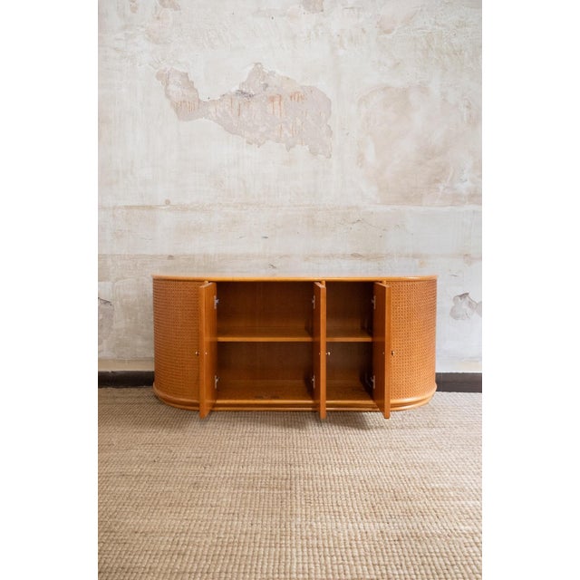Wooden Sideboard with Vienna Cane Inserts – 1970s Italian sideboard from the 1970s featuring a wooden structure with a...