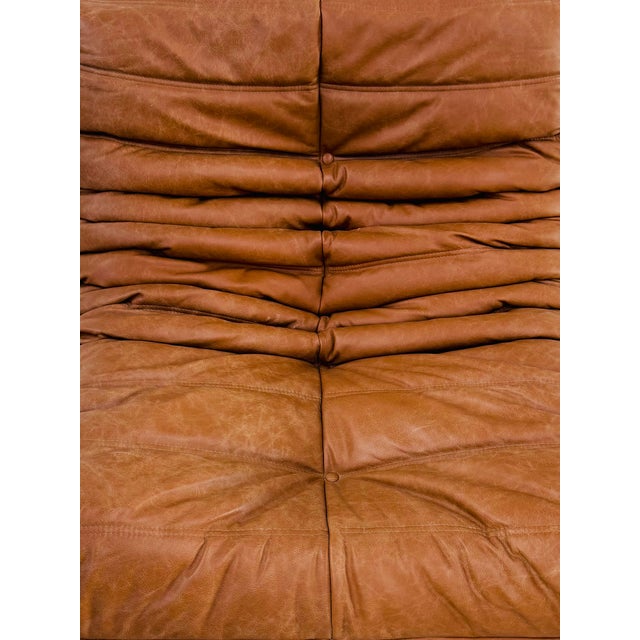 Vintage Togo Lounge Chair in Cognac Leather by Michel Ducaroy for Ligne Roset, in Restored conditions. Designed 1970 to...
