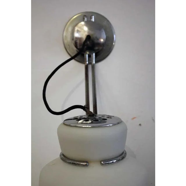 - Large architectural wall lamp in chromed metal and opaline glass - Signed with original Arteluce label - Perfect...