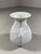 Lovely vase by AK Kaiser, Germany (signed). White bisque porcelain with stylized flower relief. 1960’s. In very good...
