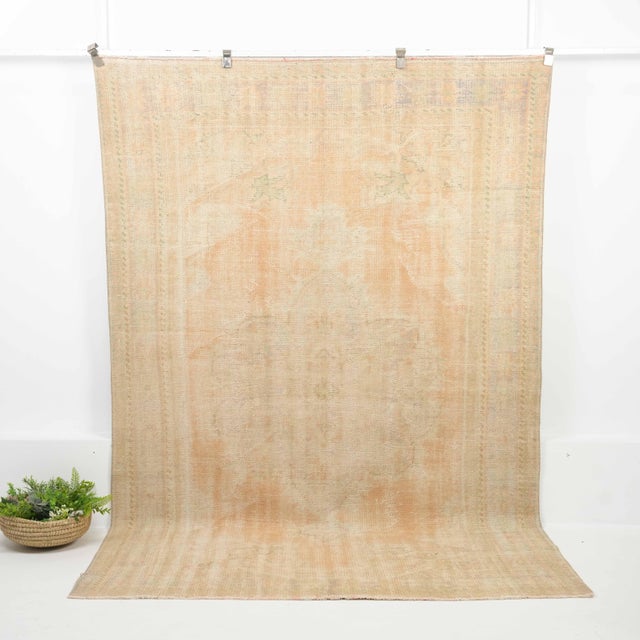 Vintage Turkish Hand-Knotted vintage rug is a semi-antique vintage Area rug.'70s Eastern region of Turkey's unique rug is...