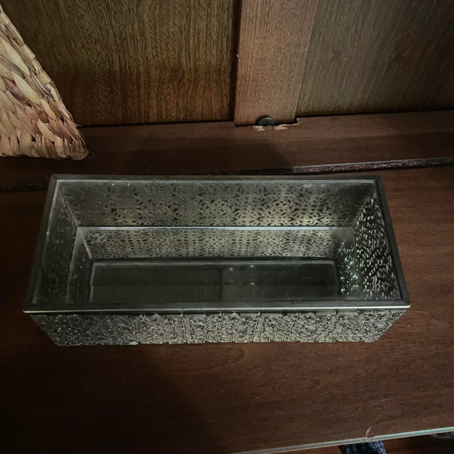 1980's reticulated brass jewelry box with a beveled glass lid and mirrored base. All pieces are in very good condition...