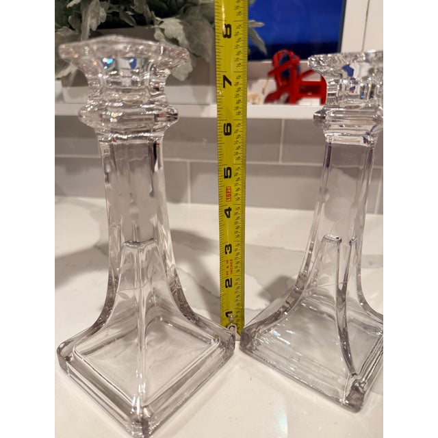 Pair of clear etched candlesticks with flowers, stems and leaves. These unique candles have the flowers etched on the...