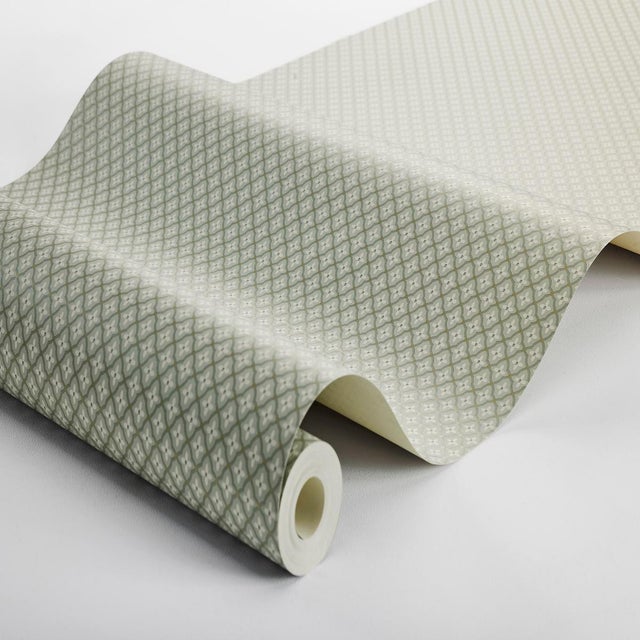 Viewed from afar, Boråstapeter Selma appears as a solid, but up close, its refined geometric repeat reveals a petite,...