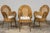 Sourced from Châteauneuf-les-Martigues in Provence, France, this elegant set of six French Riviera dining armchairs...