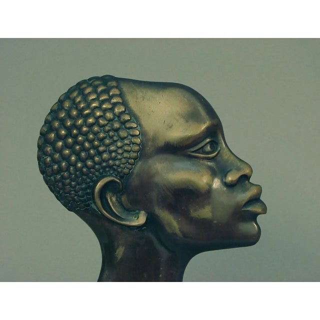 I simply couldn't resist adding function to this compelling bust; that is, making it into a lamp. It was plenty inspiring...