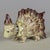 A late 19th century French Blois faience whimsical porcupine figurine. Hand-painted with greenish yellow body and brown...