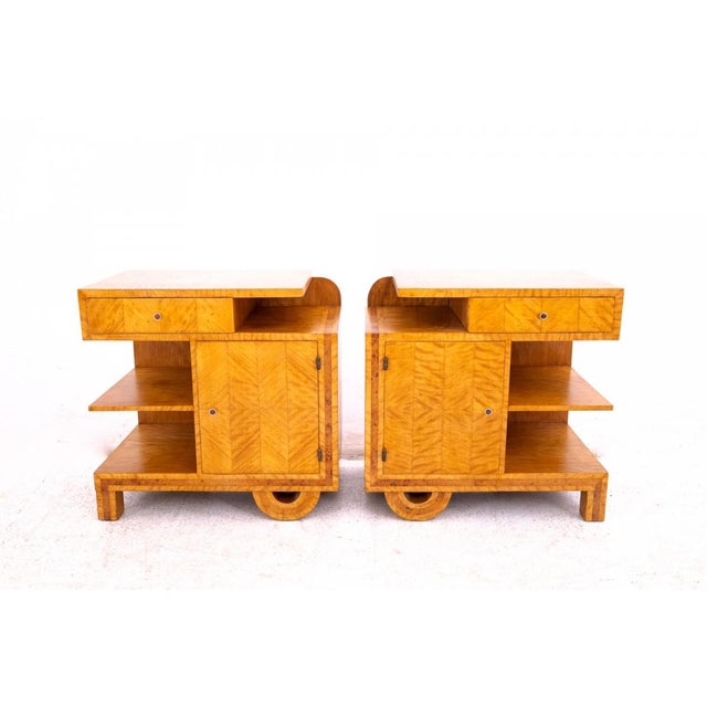 A unique pair of art deco nightstands, poland, c. 1930, professionally restored. an exceptional and highly decorative pair...