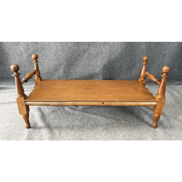 This antique floor quilting frame features beautifully turned posts and spindle stretchers, giving it a refined,...