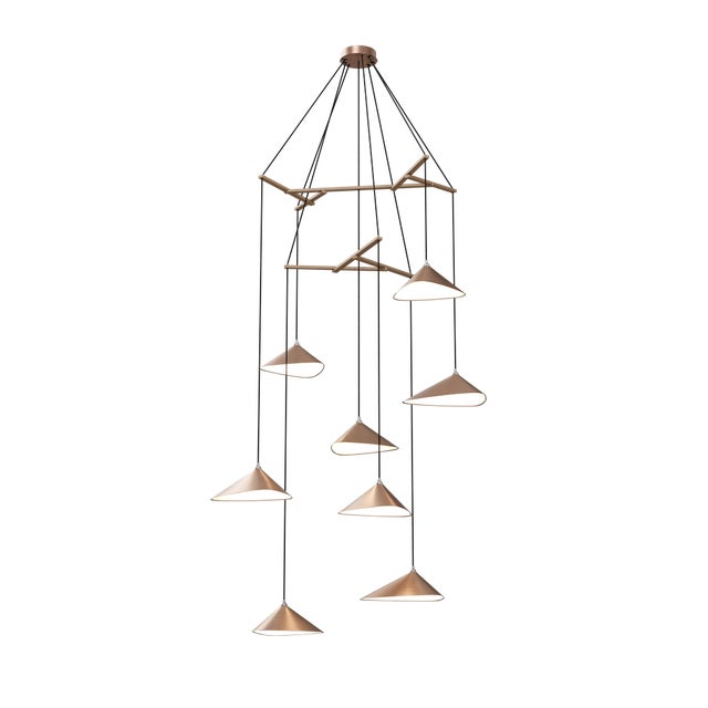 Emily is a series of handmade sheet steel lampshades in various finishes and spatial arrangements. The Vertical models of...