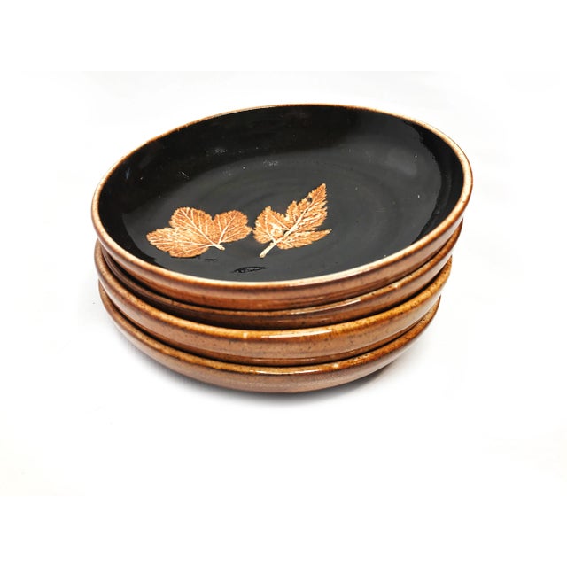 Vintage mid century set of 4 hand thrown York Rose Pottery dishes, made in England. Each of these beautiful pieces of...