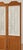 Beautiful vintage three-panel wooden folding room divider featuring a warm honey-toned finish, elegant scalloped tops, and...