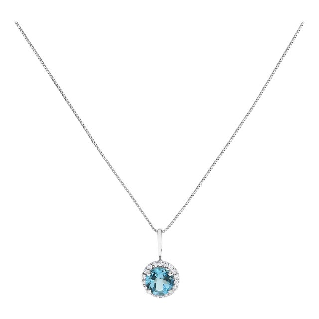 10K White Gold Blue Topaz and 1/10 Cttw Diamond Accent Halo Pendant Necklace For Sale