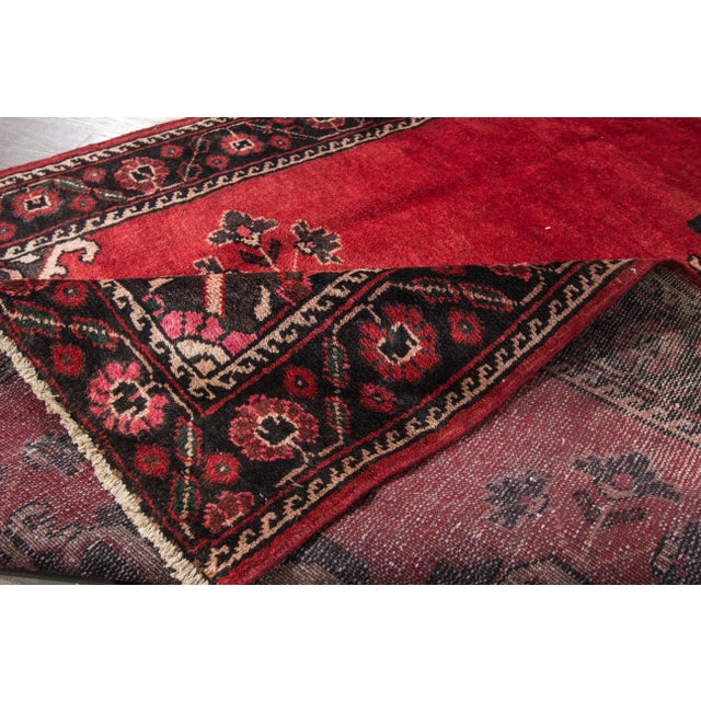 Beautiful Vintage Hamadan Handmade Wool Rug with a red field. This rug has accents of gray, pink, and beige in an allover...