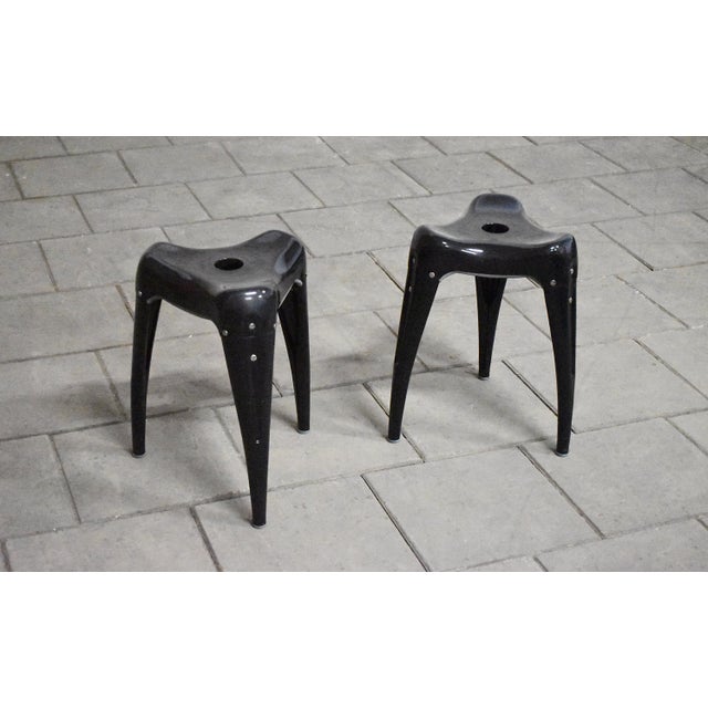 Model Wisdom Tooth stools designed in 1988 by Yasu Sasamoto and manufactured by Dulton, Japan. Painted metal. This piece...