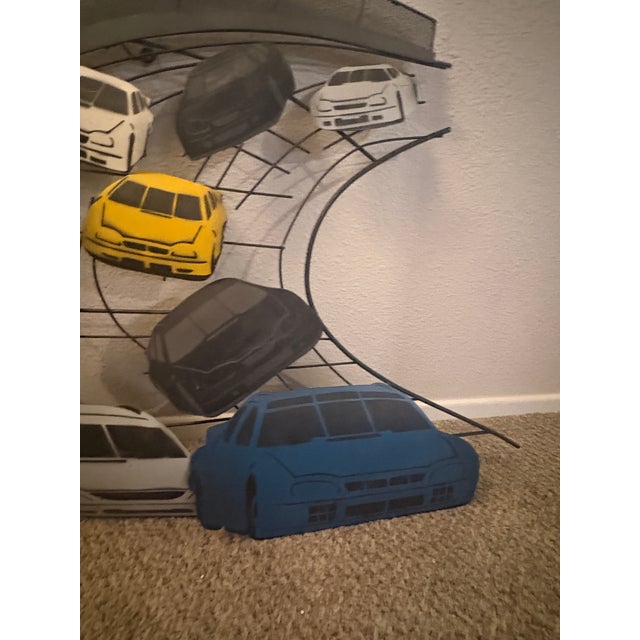 Rare and striking large-scale metal wall sculpture by Curtis Jeré, signed and dated "C. Jeré 2002" on the base. Features a...