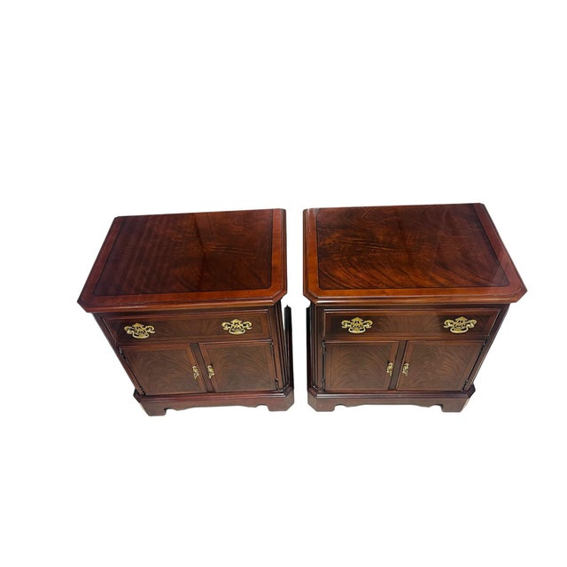 Gorgeous set of 2 Drexel cherry flame Chippendale Mahogany nightstands with Brass batwing hardware. Beautiful detailing-...