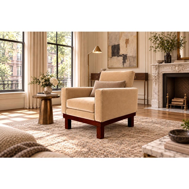A commanding example of 1960s Brazilian modern design, this armchair balances architectural rigor with generous,...