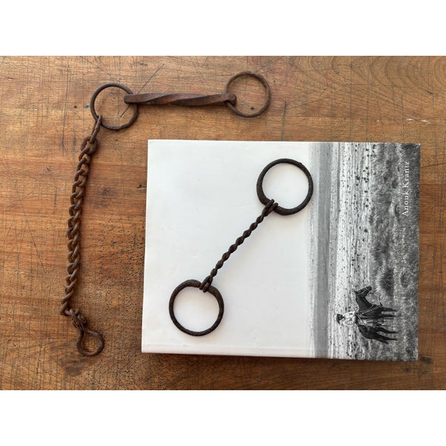 Here is a set of 2 antique twisted horse snaffle bits circa early 1900s, including one with a large curb chain. This...