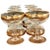 Elegant set of eight vintage champagne coupes marked France, distinguished by luminous clear bowls accented with rich gold...