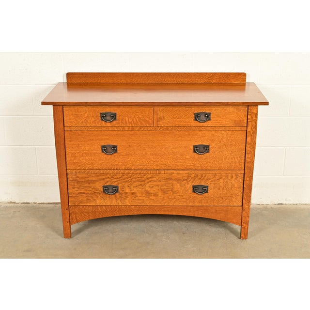 An exceptional Mission or Arts & Crafts four-drawer dresser or chest of drawers By Stickley USA, Circa Early 21st Century...