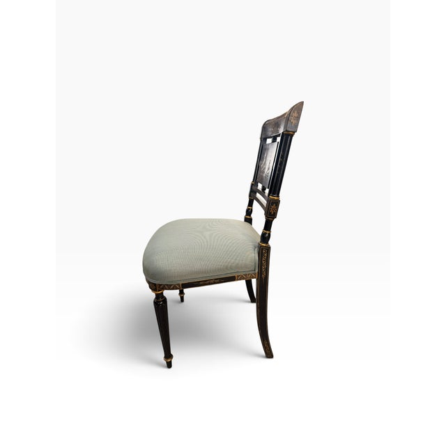 Elevate your dining space with this striking set of five (5) Regency-style dining side chairs by the high-end maker...