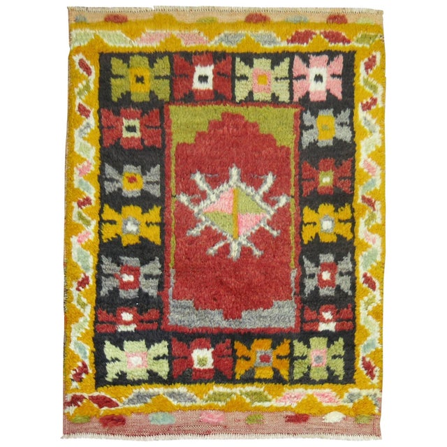 Turkish Konya small throw size square rug with a floral medallion and border design.