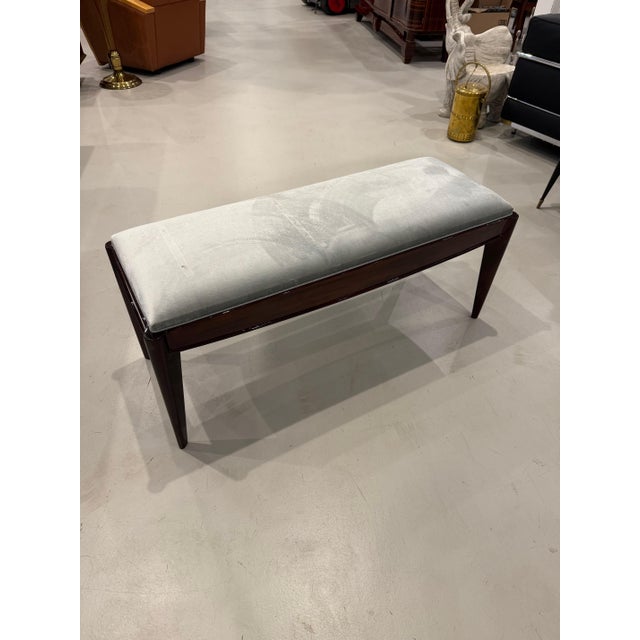 French Art Deco Walnut Bench fully restored. Having a beautiful walnut wood frame with styled legs. With reupholstered...