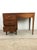 This mid century modern writing desk features hardwood construction, walnut veneer with original finish, four dovetailed...