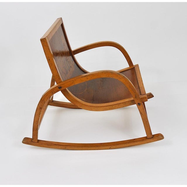 A beautiful and cute little Bauhaus rocking chair for children. Made in Germany in the 1950s, in the style of Hans...