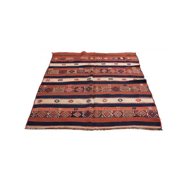 Vintage handwoven decorative kilim rug from Malatya region of Turkey. Approximately 50-60 years old. In very good...