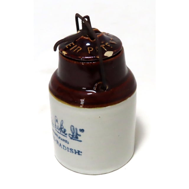 A Very Unusual Small Size Antique American Stoneware Horse Radish Jar. Circa early 1900s. Front has Blue Decorated...