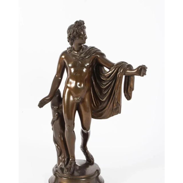 This is a truly magnificent antique Victorian patinated bronze sculpture of the famous Greek God Apollo, modelled upon a...