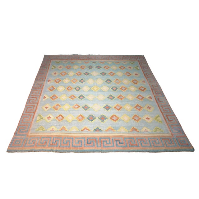 This vintage 10x9 Dhurrie flat weave is an exciting new entry in Rug & Kilim’s esteemed collection. Handwoven in wool, it...