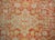 A stunning late 19th century Turkish Oushak rug with a large floral and scrolling vine medallion living amidst a field of...