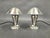 A refined pair of bauhaus table lamps from 1930s czechoslovakia. Executed in chrome plated metal, these lamps feature...