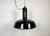 Industrial black enamel pendant light made in former Czechoslovakia during the 1960s. White enamel inside the shade. Cast...